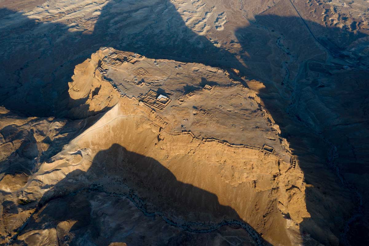 Last desert sunlight on Masada, Israel