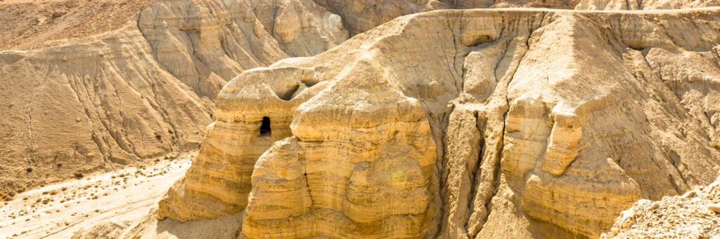Panoramic view of the caves of Qumran, where the Dead Sea Scrolls were discovered, Israel