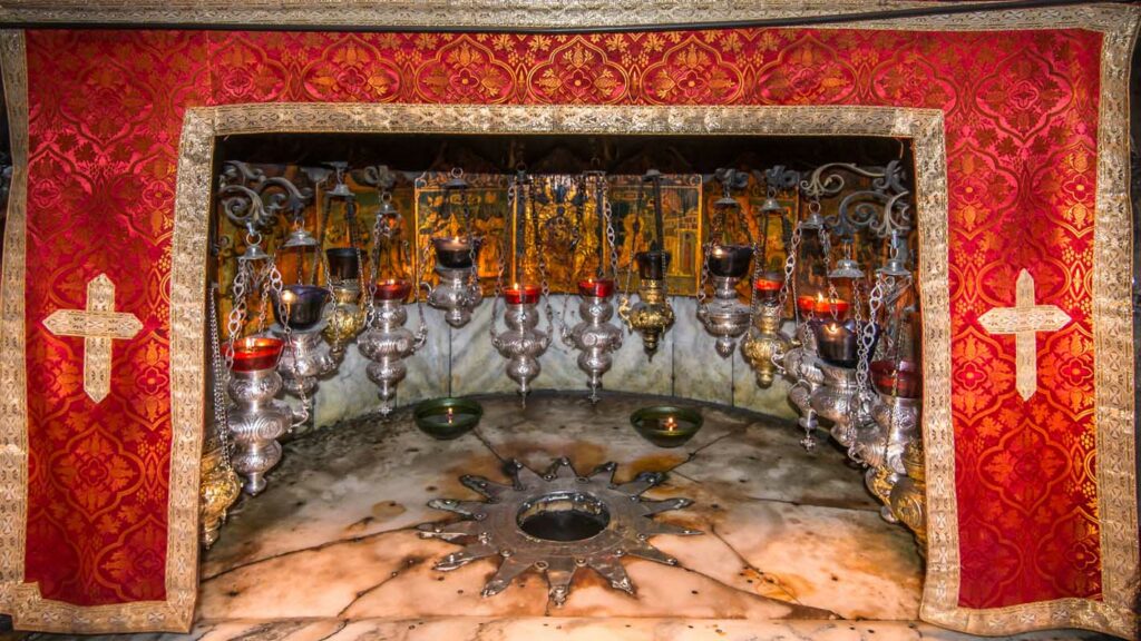 The silver star in the grotto beneath the Church of the Nativity in Bethlehem, marking the traditional site of Jesus's birth